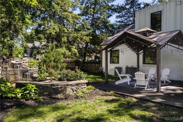 200 N Ridge Rd, Henrico, VA 23229 - view of yard featuring a patio area and central AC unit