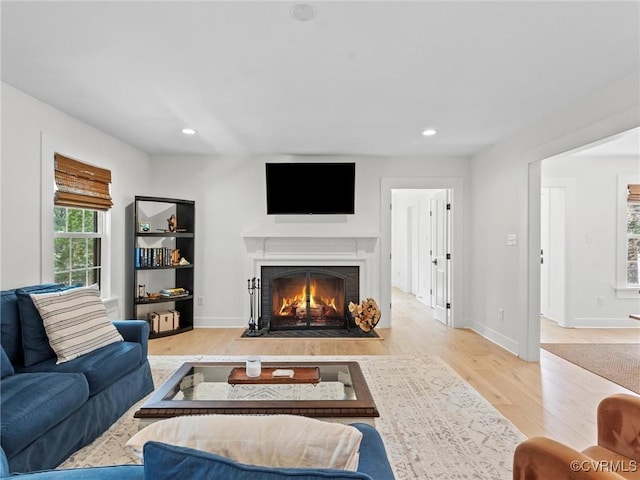 200 N Ridge Rd, Henrico, VA 23229 - living area featuring wood finished floors, a fireplace with flush hearth, recessed lighting, and baseboards