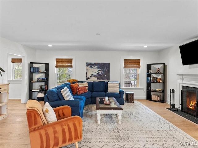 200 N Ridge Rd, Henrico, VA 23229 - living area featuring healthy amount of natural light, light wood-style floors, a fireplace with flush hearth, recessed lighting, and baseboards