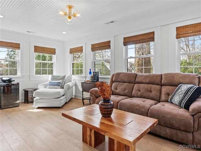 200 N Ridge Rd, Henrico, VA 23229 - living room featuring plenty of natural light, light wood-style floors, a chandelier, ornamental molding, and recessed lighting