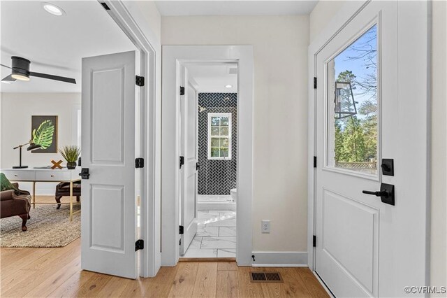 200 N Ridge Rd, Henrico, VA 23229 - foyer entrance with healthy amount of natural light, light wood-style floors, baseboards, and recessed lighting