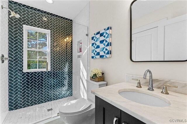 200 N Ridge Rd, Henrico, VA 23229 - bathroom with tiled shower, toilet, and vanity