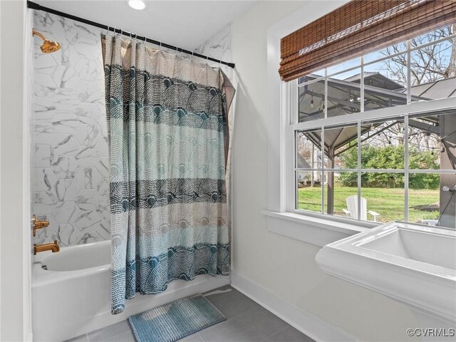 200 N Ridge Rd, Henrico, VA 23229 - full bath with tile patterned floors, shower / bath combo, and baseboards