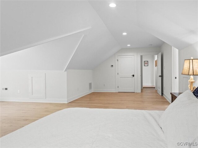 200 N Ridge Rd, Henrico, VA 23229 - unfurnished bedroom featuring light wood-style flooring, vaulted ceiling, recessed lighting, and baseboards