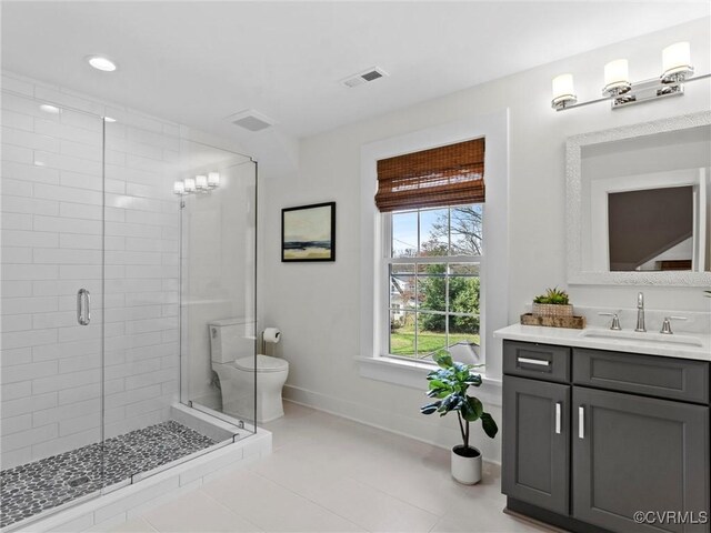200 N Ridge Rd, Henrico, VA 23229 - bathroom with baseboards, toilet, a stall shower, tile patterned flooring, and vanity