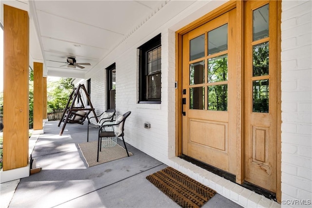 200 N Ridge Rd, Henrico, VA 23229 - entrance to property featuring covered porch, a ceiling fan, and brick siding