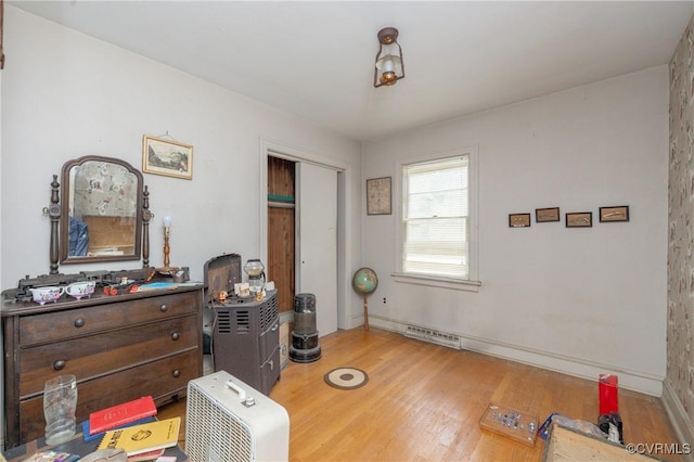8912 Michaux Ln, Henrico, VA 23229 - bedroom with wood finished floors, baseboards, and a closet
