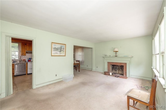 8912 Michaux Ln, Henrico, VA 23229 - living room featuring carpet floors, healthy amount of natural light, and a fireplace