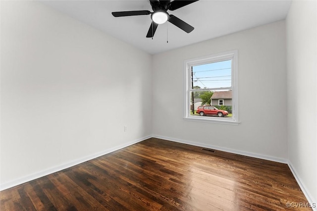 5314 Marian St, Richmond, VA 23226 - spare room with baseboards, dark wood-style flooring, and a ceiling fan