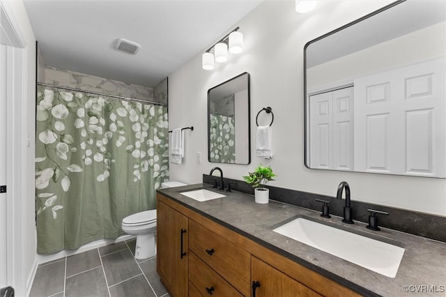 5314 Marian St, Richmond, VA 23226 - bathroom featuring tile patterned floors, toilet, double vanity, and a shower with curtain