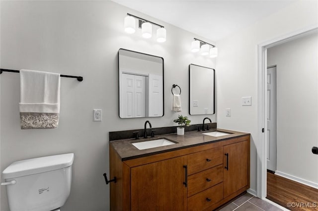 5314 Marian St, Richmond, VA 23226 - bathroom with double vanity, toilet, and tile patterned flooring