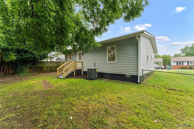 5314 Marian St, Richmond, VA 23226 - rear view of house featuring cooling unit and crawl space