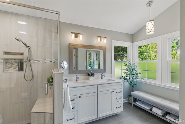 3700 Milbranch Pl, Henrico, VA 23233 - full bathroom with double vanity, a shower stall, vaulted ceiling, and tile patterned floors