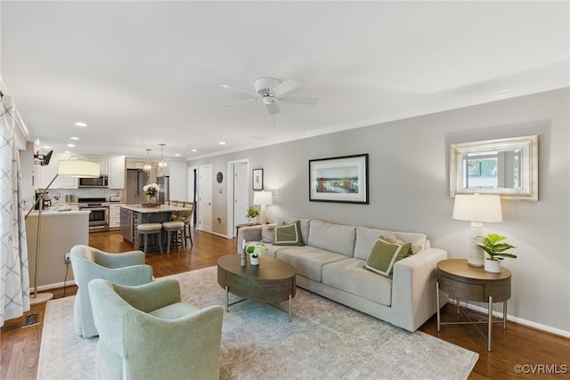 3700 Milbranch Pl, Henrico, VA 23233 - living room with ornamental molding, dark wood-style floors, a ceiling fan, baseboards, and recessed lighting