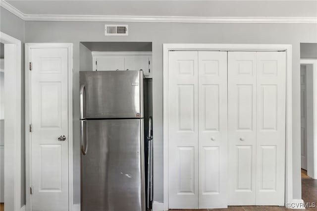 2207 Turtle Hill Cir, Midlothian, VA 23112 - kitchen featuring freestanding refrigerator, white cabinetry, and crown molding