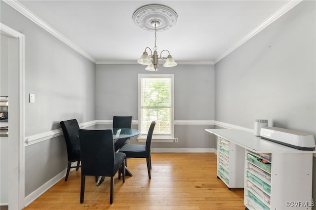 2207 Turtle Hill Cir, Midlothian, VA 23112 - dining area featuring light wood-type flooring, a chandelier, baseboards, and ornamental molding