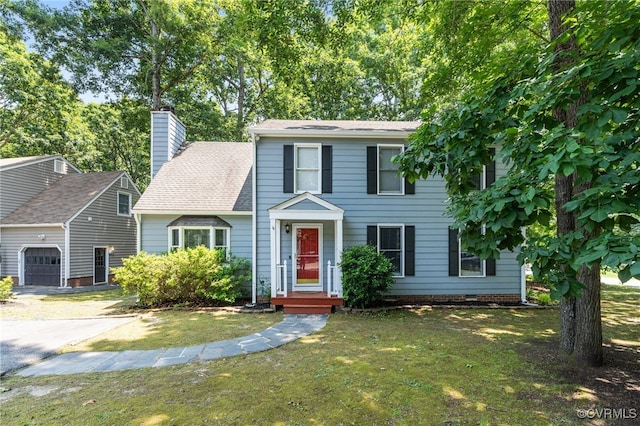 2207 Turtle Hill Cir, Midlothian, VA 23112 - view of front facade with a front lawn, a garage, and a chimney