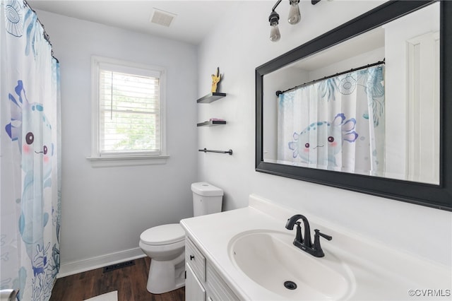2207 Turtle Hill Cir, Midlothian, VA 23112 - full bathroom featuring toilet, vanity, wood finished floors, baseboards, and a shower with curtain
