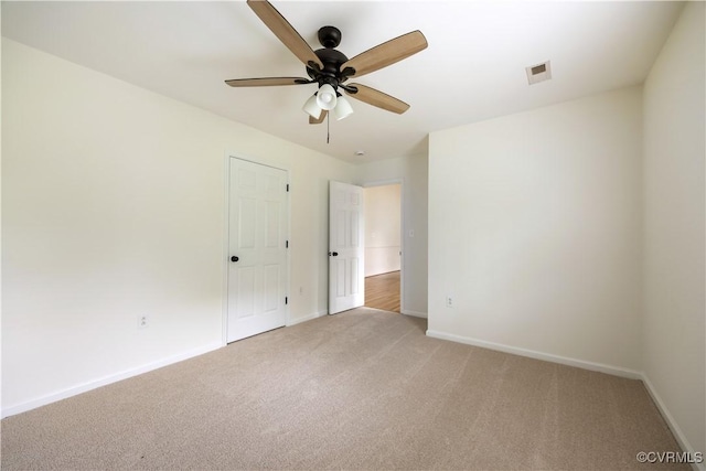 5 Walters Way, Bumpass, VA 23024 - unfurnished bedroom featuring light colored carpet, baseboards, and ceiling fan
