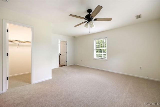 5 Walters Way, Bumpass, VA 23024 - unfurnished bedroom featuring light colored carpet, baseboards, and a spacious closet