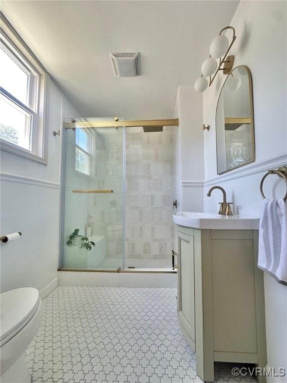 1500 N 23rd St, Richmond, VA 23223 - bathroom with a stall shower, vanity, and tile patterned floors