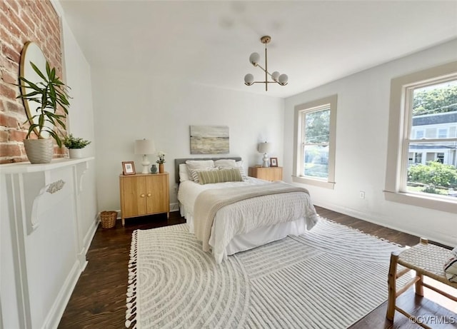 1500 N 23rd St, Richmond, VA 23223 - bedroom featuring multiple windows and dark wood finished floors