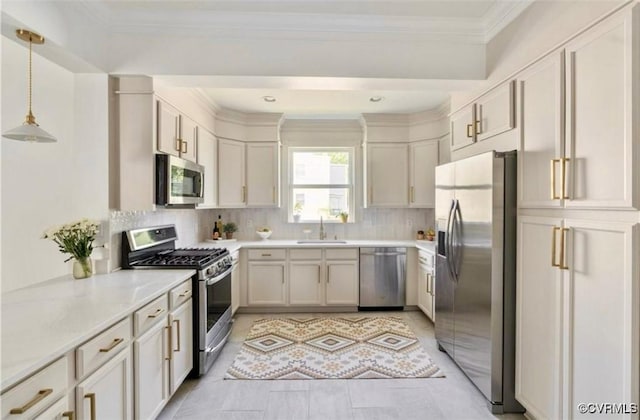 1500 N 23rd St, Richmond, VA 23223 - kitchen featuring stainless steel appliances, decorative backsplash, light countertops, crown molding, and pendant lighting