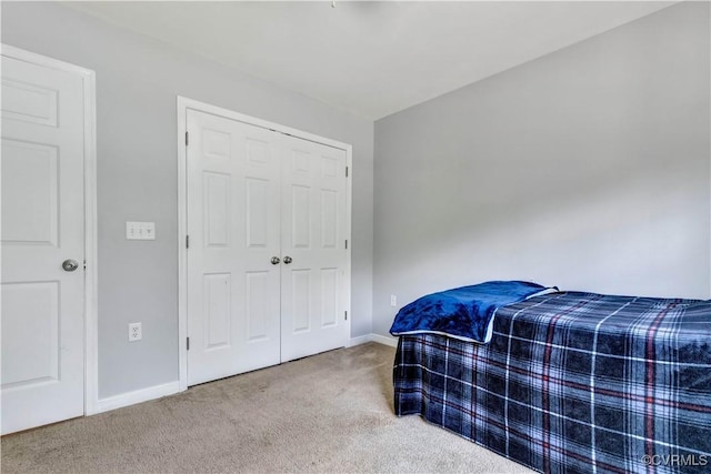 8118 Mimosa Hill Ln, Mechanicsville, VA 23116 - carpeted bedroom with baseboards and a closet