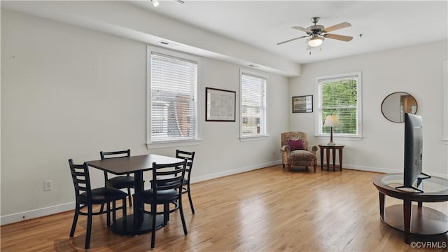 1901 E Broad St Unit U31, Richmond, VA 23223 - dining space with ceiling fan, light wood-style flooring, and baseboards