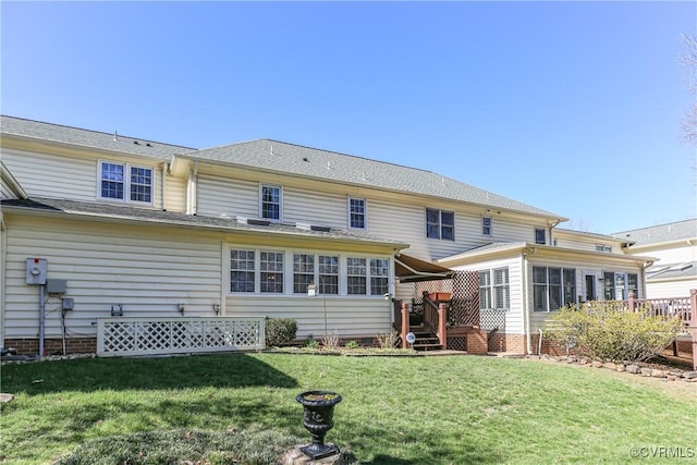 10003 Four Iron Ct, Fredericksburg, VA 22408 - back of property with a yard, a wooden deck, and a sunroom