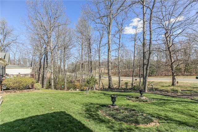 10003 Four Iron Ct, Fredericksburg, VA 22408 - view of grassy yard with a deck