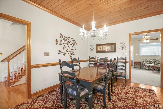 10003 Four Iron Ct, Fredericksburg, VA 22408 - dining area featuring wood ceiling, crown molding, wood finished floors, a chandelier, and stairway