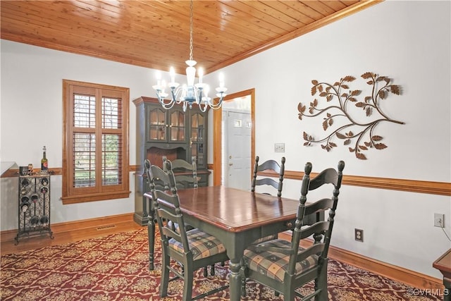 10003 Four Iron Ct, Fredericksburg, VA 22408 - dining space featuring wood ceiling, a chandelier, crown molding, wood finished floors, and baseboards