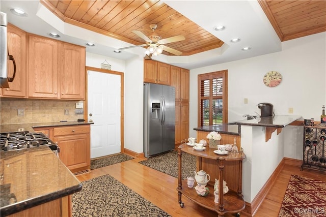 10003 Four Iron Ct, Fredericksburg, VA 22408 - kitchen featuring stainless steel fridge, a raised ceiling, wooden ceiling, baseboards, and light wood-style flooring