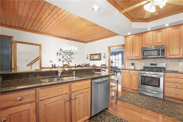 10003 Four Iron Ct, Fredericksburg, VA 22408 - kitchen with stainless steel appliances, wooden ceiling, a sink, ornamental molding, and wood finished floors