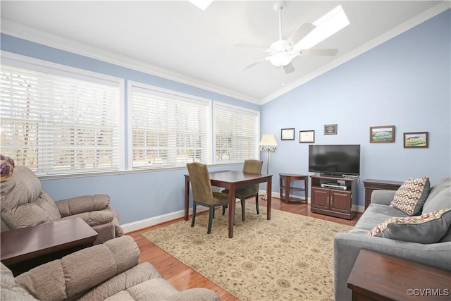 10003 Four Iron Ct, Fredericksburg, VA 22408 - living area featuring lofted ceiling, wood finished floors, ceiling fan, crown molding, and baseboards