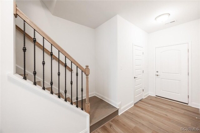 18709 Palisades Cove Trl, Moseley, VA 23120 - foyer entrance featuring wood finished floors and stairs