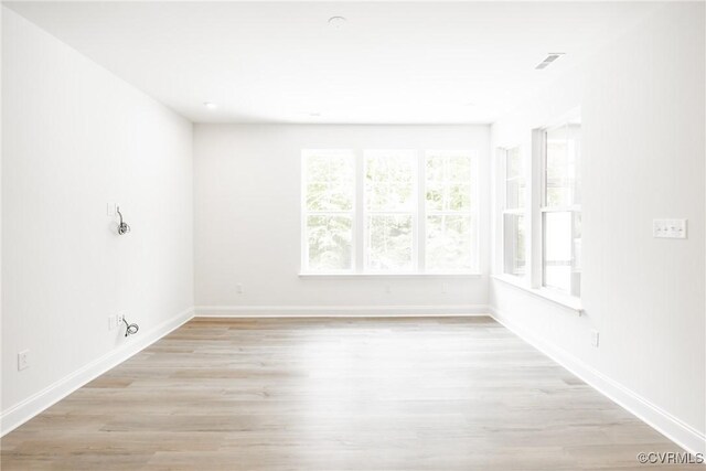 18709 Palisades Cove Trl, Moseley, VA 23120 - empty room featuring light wood-style flooring