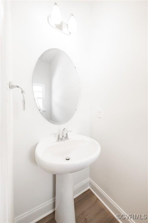 18709 Palisades Cove Trl, Moseley, VA 23120 - bathroom with baseboards and wood finished floors