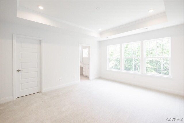 18709 Palisades Cove Trl, Moseley, VA 23120 - unfurnished bedroom featuring a raised ceiling, light colored carpet, ornamental molding, recessed lighting, and ensuite bathroom