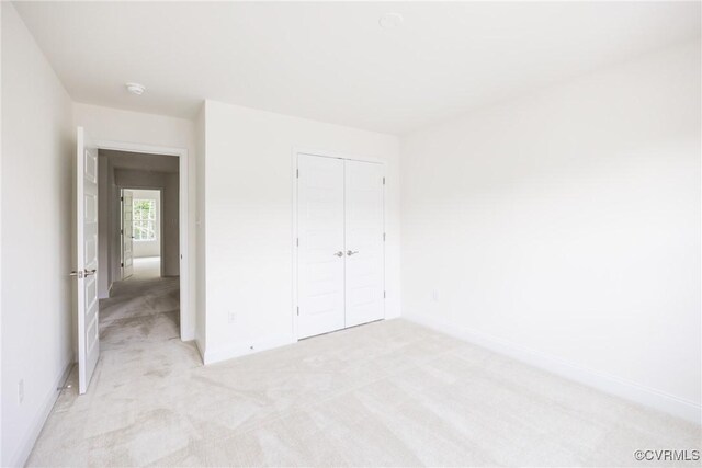18709 Palisades Cove Trl, Moseley, VA 23120 - unfurnished bedroom featuring light carpet and a closet