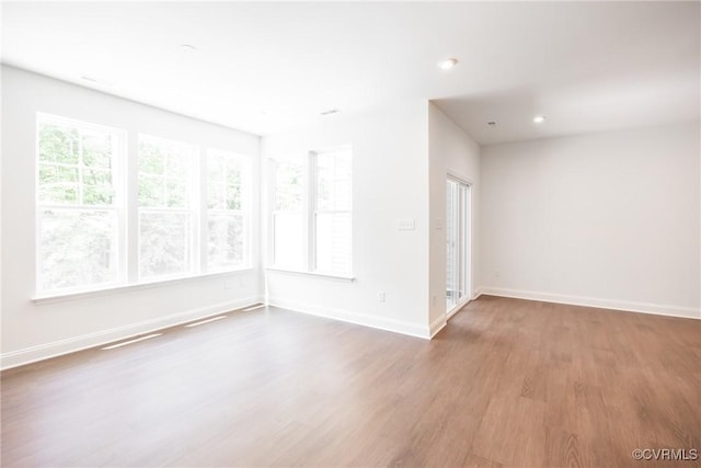 18713 Palisades Cove Trl, Moseley, VA 23120 - unfurnished room with wood finished floors and recessed lighting