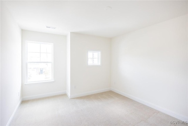 18713 Palisades Cove Trl, Moseley, VA 23120 - spare room featuring light colored carpet and baseboards