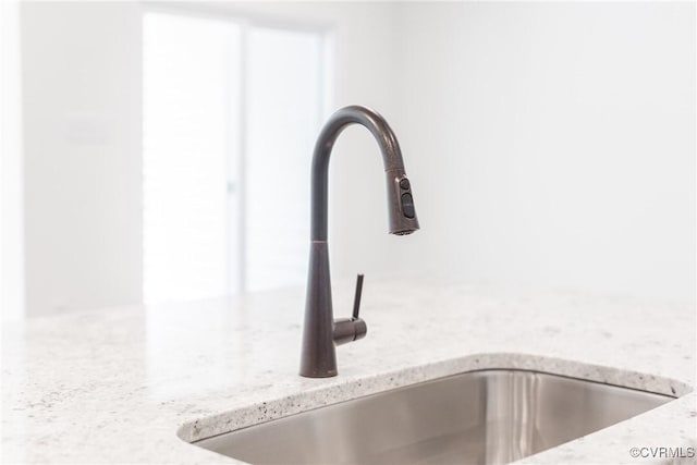18713 Palisades Cove Trl, Moseley, VA 23120 - kitchen view of a sink and light stone countertops