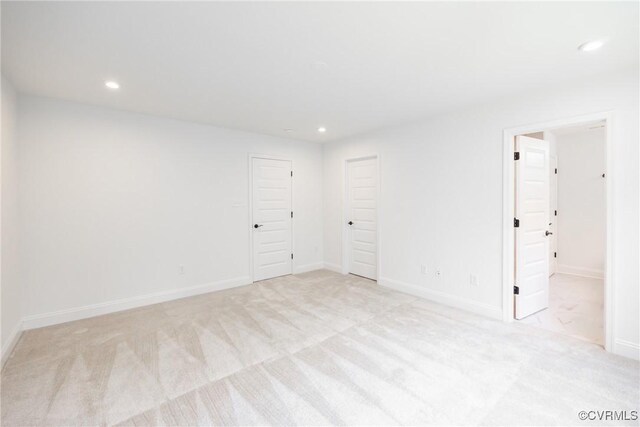 18713 Palisades Cove Trl, Moseley, VA 23120 - spare room featuring recessed lighting and light carpet