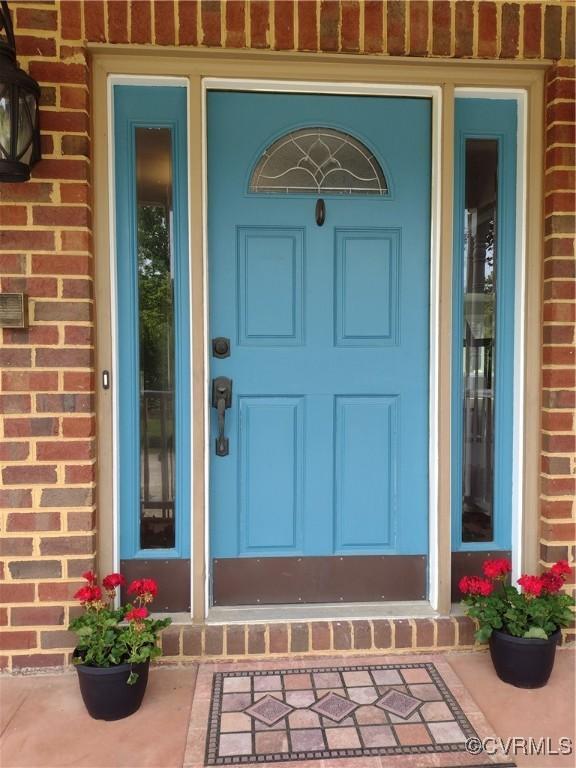 3249 N Maidens Rd, Maidens, VA 23139 - doorway to property with brick siding