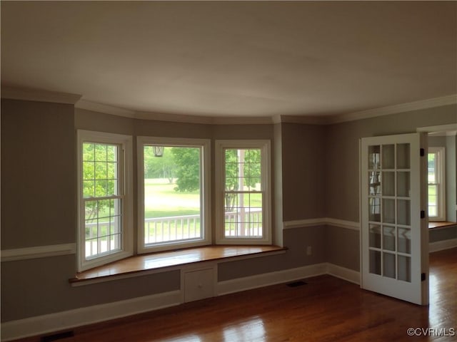 3249 N Maidens Rd, Maidens, VA 23139 - empty room featuring wood finished floors, baseboards, and crown molding