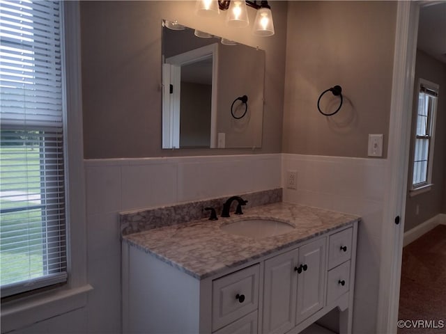 3249 N Maidens Rd, Maidens, VA 23139 - bathroom featuring vanity and a wainscoted wall