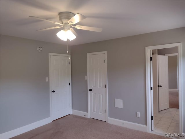 3249 N Maidens Rd, Maidens, VA 23139 - unfurnished bedroom with baseboards, light carpet, and ceiling fan