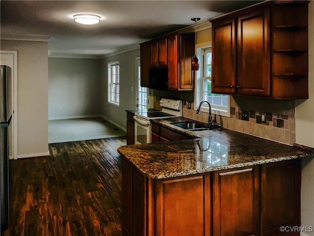 8069 Kiwi Ln, Mechanicsville, VA 23111 - kitchen featuring electric stove, a sink, ornamental molding, dark wood-type flooring, and dark stone countertops